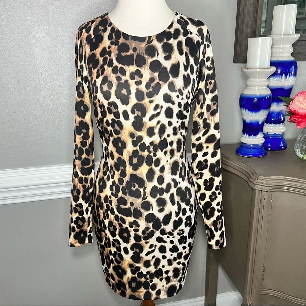 EUC S Bebe Bodycon Dress Leopard Print Hourglass Long sleeve Leopard Dress 039